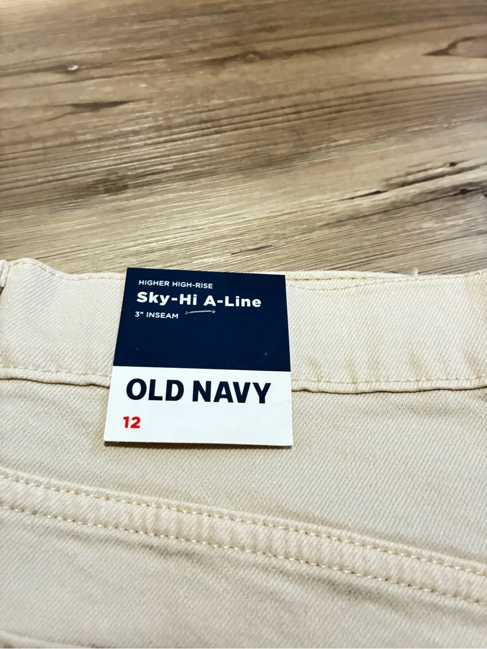 Old Navy Sky-hi A-line 3” denim short Ecru Size 12 Hidden button fly Raw hem NWT